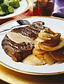 Beef steak with fried potatoes