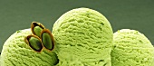 Three scoops of pistachio ice cream