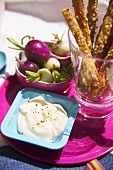 Radishes and cheese sticks with dip
