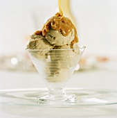 Pistachio ice cream with chocolate and caramel sauce