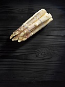 A bundle of white asparagus with purple tips
