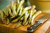 Green asparagus with knife