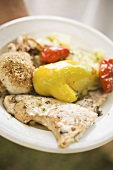 Fried fish and vegetables with potato salad