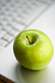 An apple on a computer