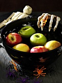 Floating apples with spiders