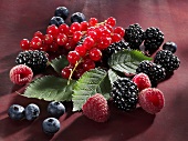 Mixed berries with leaves