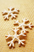 Three snowflake cookies