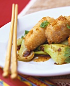 Sea bass in coconut crust with pak choi