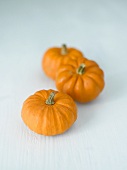 Three orange pumpkins