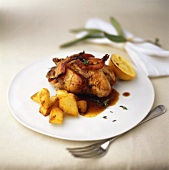 Quail with bacon and roast potatoes