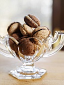 Macarons (small French cakes) in a glass bowl