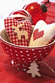 Xmas decorations: fabric hearts, wooden tree ornaments, baubles