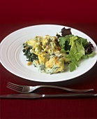 Baked tortellini with spinach, Gorgonzola and pine nuts
