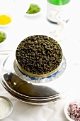 Black caviar in opened tin