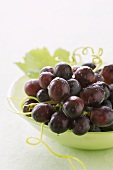 Red grapes in green bowl