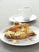 Croissant with scrambled egg and smoked salmon