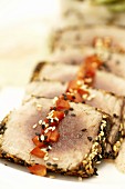 Fried tuna steaks with sesame crust