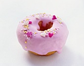 Doughnut mit rosa Zuckerglasur