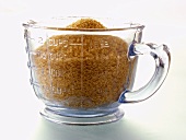 Brown Sugar Crystals in a Measuring Cup