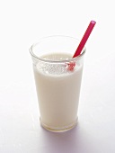 A Glass of Milk with a Red Straw