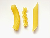 Three Types of Uncooked Pasta Macaroni, Fusilli and Penne