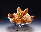Assorted sweet pastries on cake stand