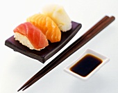 Nigiri Sushi with Dipping Sauce and Chopsticks