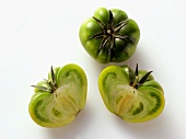 Two Halves and One Whole Green Tomatoes