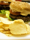 Potato Chips with Hamburger in the Background