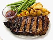 Grilled Rib Eye Steak with Potatoes and Green Beans