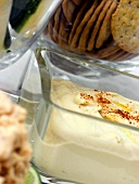 Hummus in a Glass Dish with Crackers