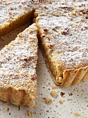 Sliced Treacle Tart Dusted with Powdered Sugar