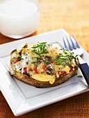 Toasted bread topped with cheese and vegetables