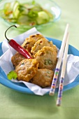 Fish cakes with chilli peppers (Thailand)