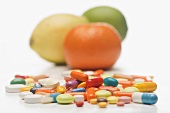 Vitamin tablets and citrus fruits