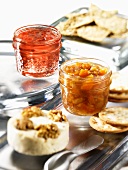 Crackers with nut cheese, chutney and jam