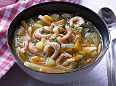 Prawn soup with vegetables and dill