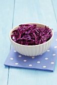 A bowl of chopped red cabbage