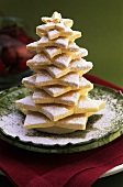 A shortbread Christmas tree with icing sugar