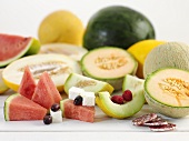 Various types of melon with feta and salami
