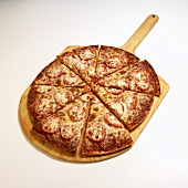 Fresh Tomato Pizza; Sliced on Pizza Wheel; White Background