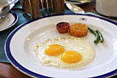 Fried egg with potato cakes