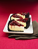 Cheese cake with sour cream, chocolate crust and cherry topping