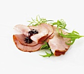 Several slices of Cumberland ham