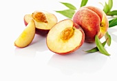 White peaches, whole and sliced