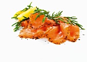 Slices of smoked salmon with glasswort