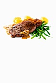 Fried pepper steak with potatoes and green asparagus