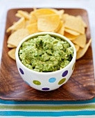 Bowl of Guacamole with Corn Chips