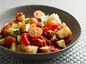 Tomato and pepper salad with croutons