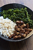 Thit kho trung (caramelised pork, Vietnam) with rice and broccoli